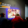 People playing video games.