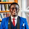 A professional headshot of graduate student Adetola Babalola
