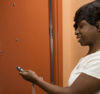 student in doorway